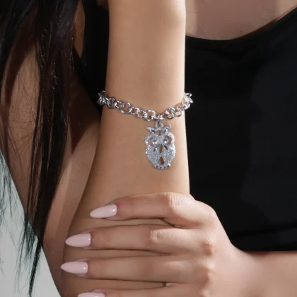 Bracciale charm Gufo Stilizzato : bracciale a catena con charm a forma di gufo stilizzato in alluminio | Shadi Bijoux